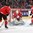 MONTREAL, CANADA - DECEMBER 30: Switzerland's Joren van Pottelgerghe #30 makes the save while Livio Stadler #5 and Raphael Prassl #17 look on during preliminary round action against Denmark at the 2017 IIHF World Junior Championship. (Photo by Francois Laplante/HHOF-IIHF Images)

